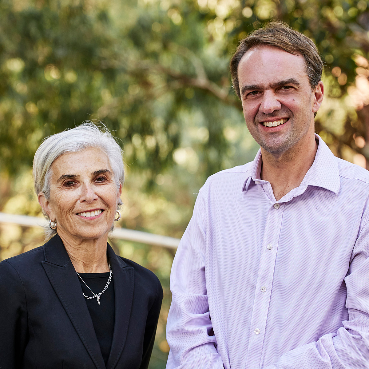 Photo of Infoxchange Chair Elana Rubin and CEO David Spriggs standing outside